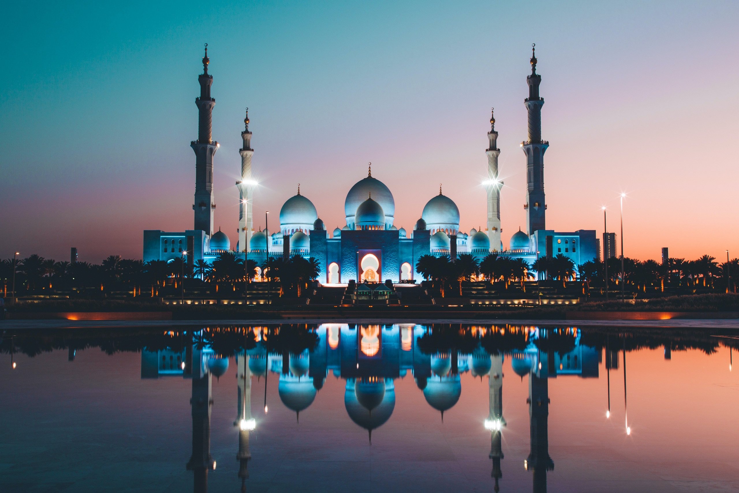 The Sheikh Zayed Grand Mosque in Abu Dhabi is light up at dusk