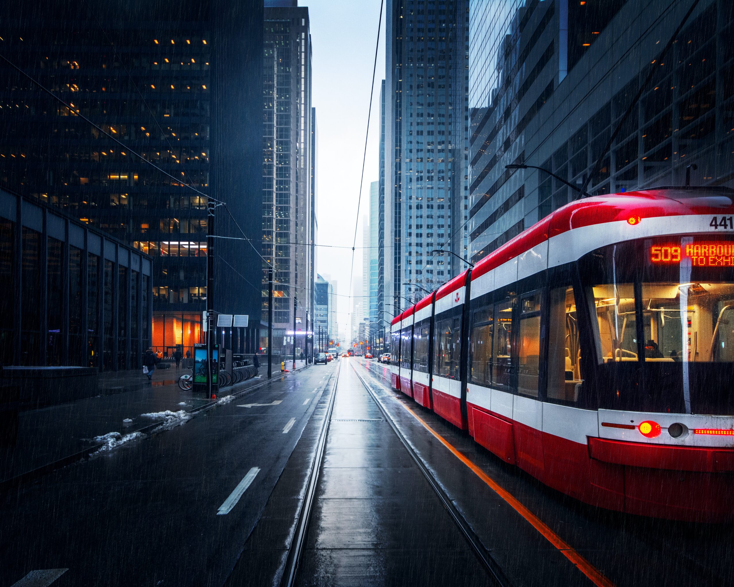 A tram runs through the center of Toronto