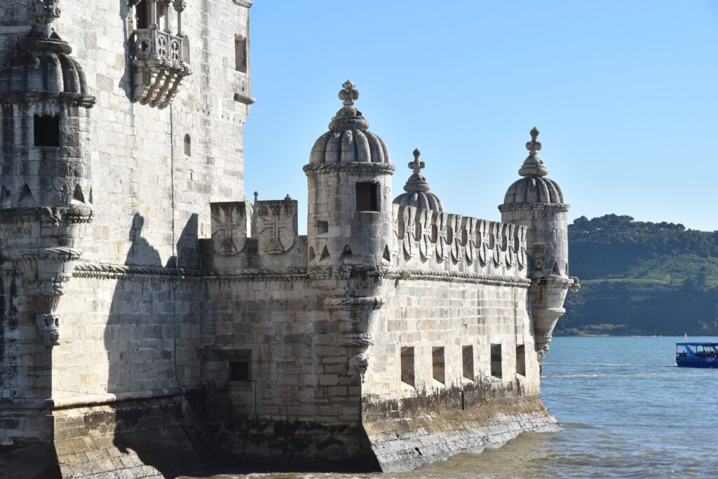 The ramparts of Belém Tower in Lisbon are covered with Manueline details and more recent crosses