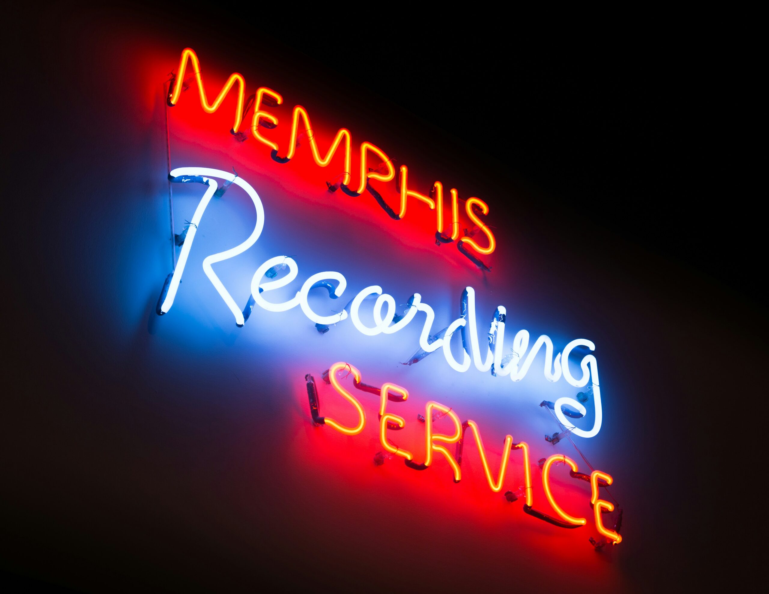 A neon sign that reads: "Memphis Recording Service"