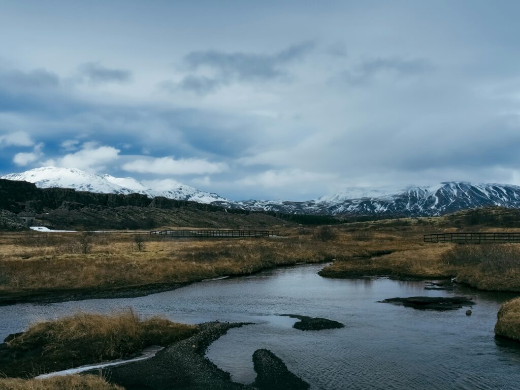 A lake is surrounded by mountains in Thingvellir National Park